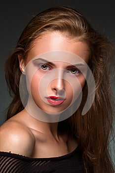 Beauty woman face closeup isolated on black background. Beautiful