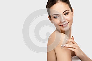 Beauty Woman face Portrait. Beautiful Spa model Girl with Perfect Clean Skin. Female looking camera smiling