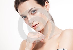 Beauty Woman face Portrait. Beautiful Spa model Girl with Perfect Fresh Clean Skin. Isolated white background