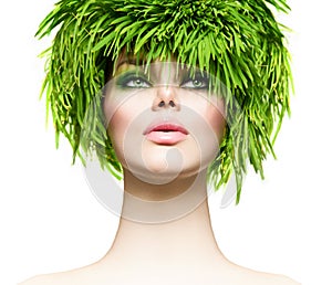 Beauty woman with fresh green grass hair