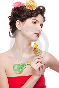Beauty woman with fruit bodyart and fruit c