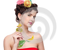 Beauty woman with fruit bodyart and fruit c