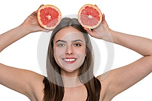 Beauty woman with grapefruit. Woman fill skin with vitamin. Skincare and diet. Young girl has clean skin. Healthy