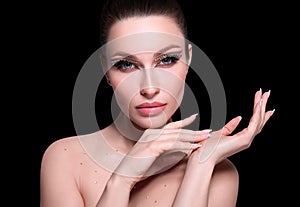 Beauty woman healthy skin concept natural makeup beautiful model girl face hands touching manicure nails