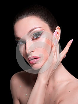 Beauty woman healthy skin concept natural makeup beautiful model girl face hands touching manicure nails