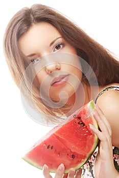 Beauty woman holding watermelon in her hand