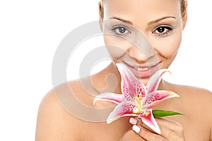 Beauty woman with a lily flower