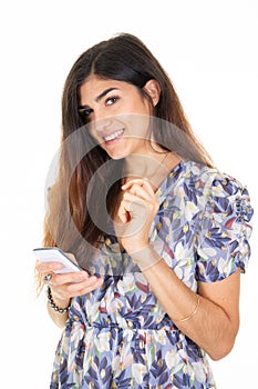 beauty woman with long hair brunette holding smartphone phone cell in hand on white background