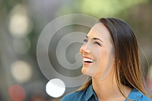 Beauty woman looking at side on the street