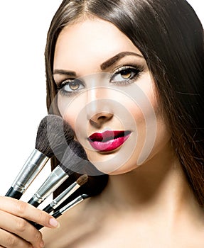 Beauty Woman with Makeup Brushes