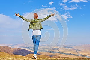 Beauty woman outdoors enjoying nature.