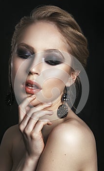 Beauty Woman with Perfect Makeup. Beautiful Professional Holiday