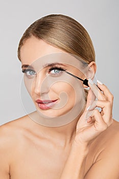 Beauty woman with perfect skin. Applying makeup concept.