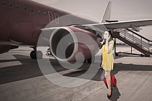 Beauty woman with plane