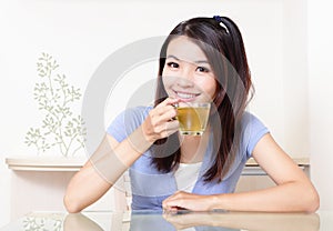 Beauty woman relax drink tea with home background