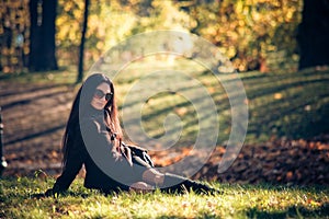 Beauty woman relaxation on the green grass