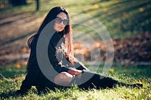 Beauty woman relaxation on the green grass