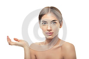 Beauty woman showing empty palm