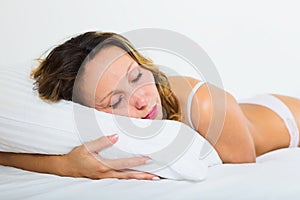 Beauty woman sleeping on white pillow