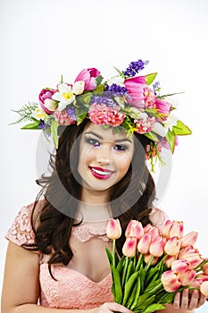 Beauty Woman with Spring Flower bouquet. Beautiful girl with a B