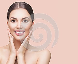 Beauty woman touching her face and smiling