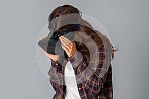 Beauty woman in virtual reality helmet