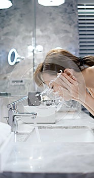 Beauty woman wash her face