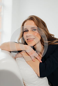 Beauty woman with white perfect smile looking at camera at home