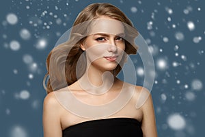 Beauty Woman Winter Snow face Portrait. Beautiful Spa model Girl