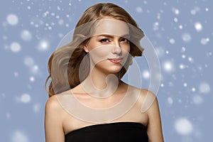 Beauty Woman Winter Snow face Portrait. Beautiful Spa model Girl