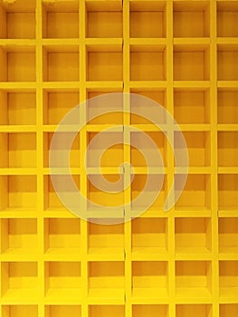 Beauty yellow square same pattern wooden block box shelves. interier decoration design in building house. no people. multi lines c