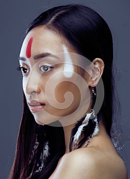 Beauty young asian girl with make up like Pocahontas, red indians woman fashion, close up beauty
