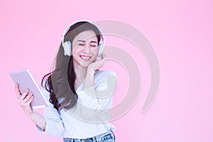 Beauty young Asian woman listening music
