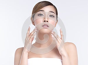 Beauty Young asian woman with perfect facial skin. Gestures for advertisement treatment spa and cosmetology