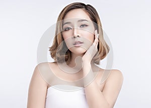 Beauty Young asian woman with perfect facial skin. Gestures for advertisement treatment spa and cosmetology