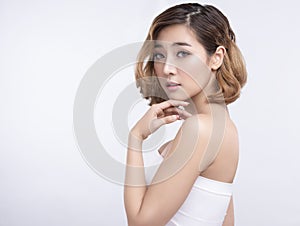 Beauty Young asian woman with perfect facial skin. Gestures for advertisement treatment spa and cosmetology