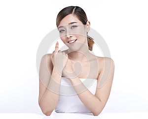 Beauty Young asian woman with perfect facial skin. Gestures for advertisement treatment spa and cosmetology