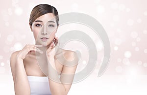 Beauty Young asian woman with perfect facial skin. Gestures for advertisement treatment spa and cosmetology