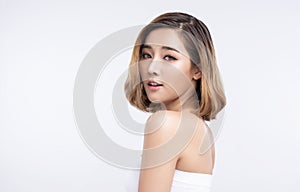 Beauty Young asian woman with perfect facial skin. Gestures for advertisement treatment spa and cosmetology