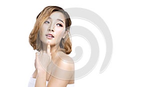Beauty young Asian woman with perfect facial skin. Gestures for advertisement treatment spa and cosmetology