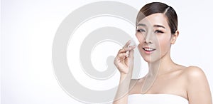 Beauty Young asian woman with perfect facial skin. Gestures for advertisement treatment spa and cosmetology on white banner