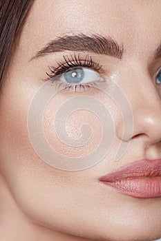 Beauty. Young Woman Close Up Portrait. Beautiful Blue-Eyed Model With Perfect Skin And Natural Daily Makeup.