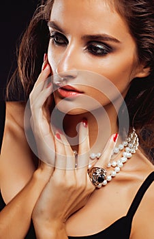 Beauty young woman with jewellery close up, luxury portrait of rich real girl, party makeup