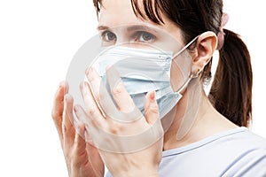 Beauty young woman wearing respiratory protective medical mask