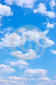 Beautyful blue sky with white clouds -  vertical background photo