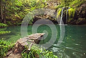 Beautyful forest waterfall photo