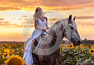 Beautyful woman with horse on nature