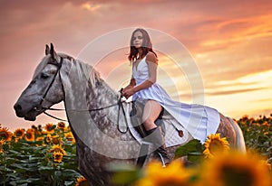 Beautyful woman with horse on nature