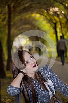 Beautyful woman sitting in park