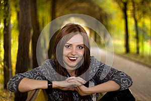 Beautyful woman sitting in park